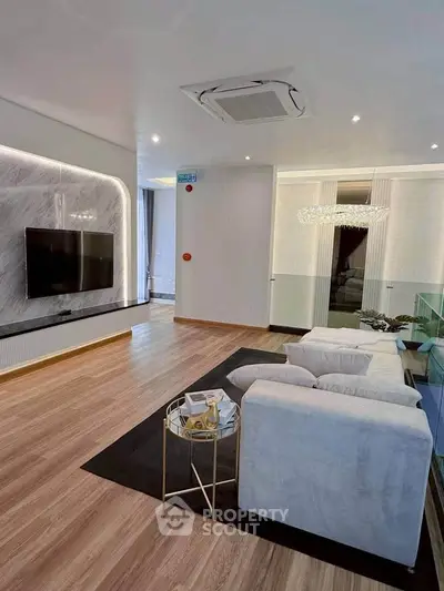 Luxurious modern living room with sleek design and elegant lighting