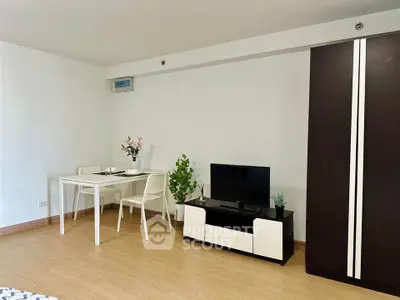 Modern living room with sleek furniture and minimalist decor, perfect for urban living.