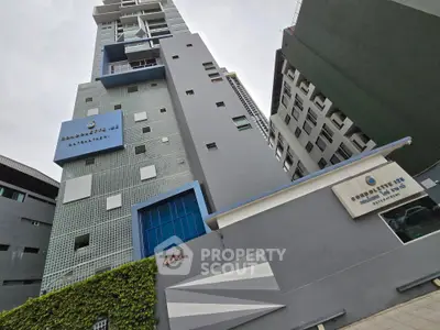 Modern high-rise building with sleek architecture and urban appeal in a prime city location.