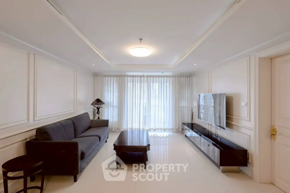 Elegant living room with modern furniture and natural light