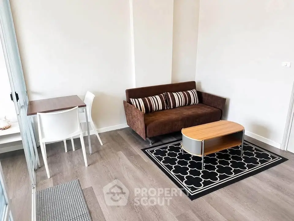 Modern living room with stylish sofa and coffee table in a cozy apartment.