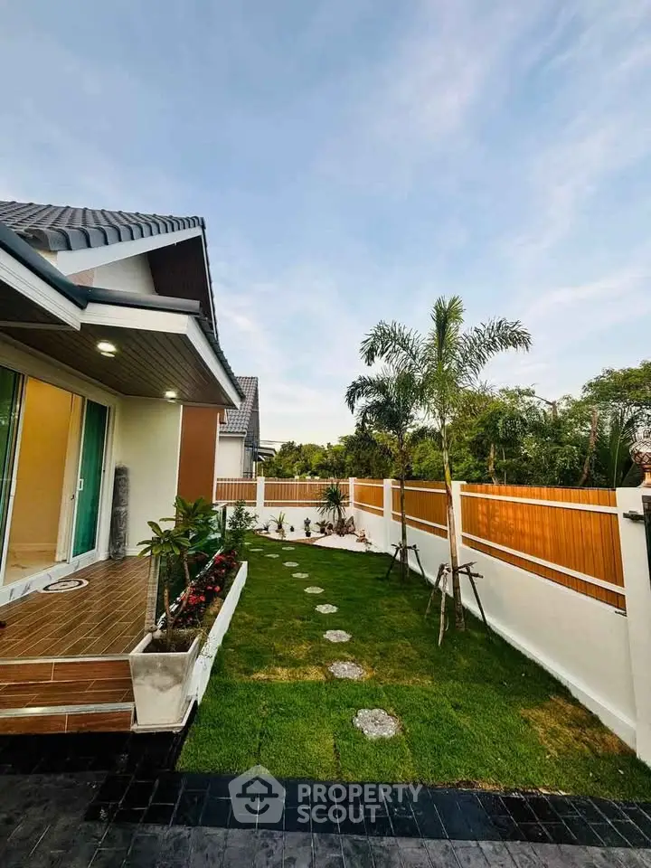 Charming suburban home with lush garden and modern exterior design