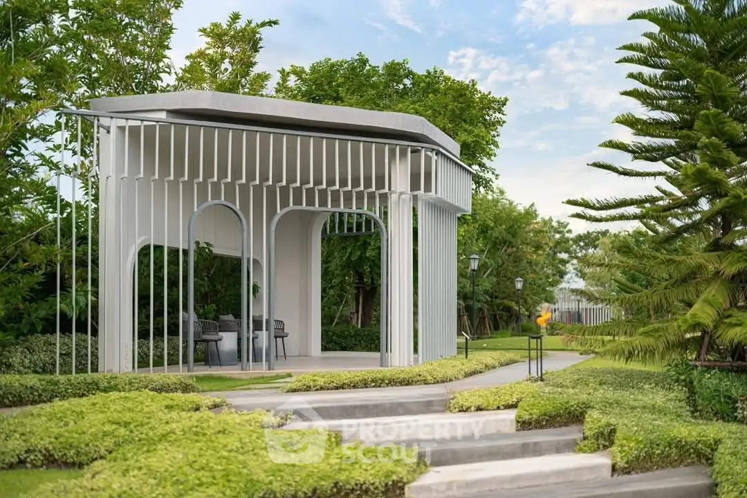Modern garden gazebo with lush greenery and stylish design