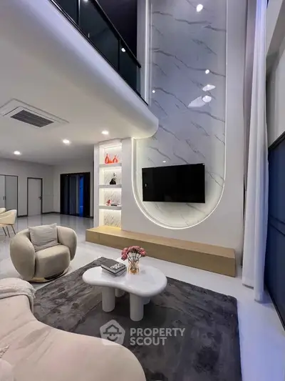 Luxurious modern living room with high ceilings and elegant decor