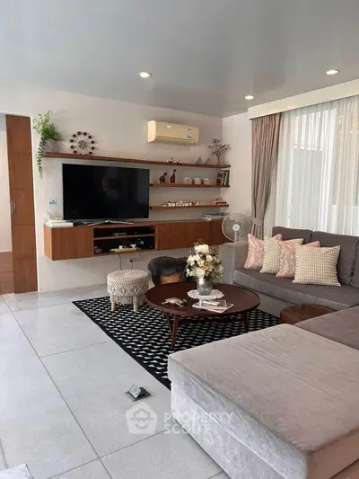 Modern living room with stylish decor and cozy seating area