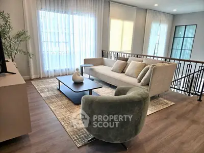 Stylish modern living room with elegant furniture and natural light