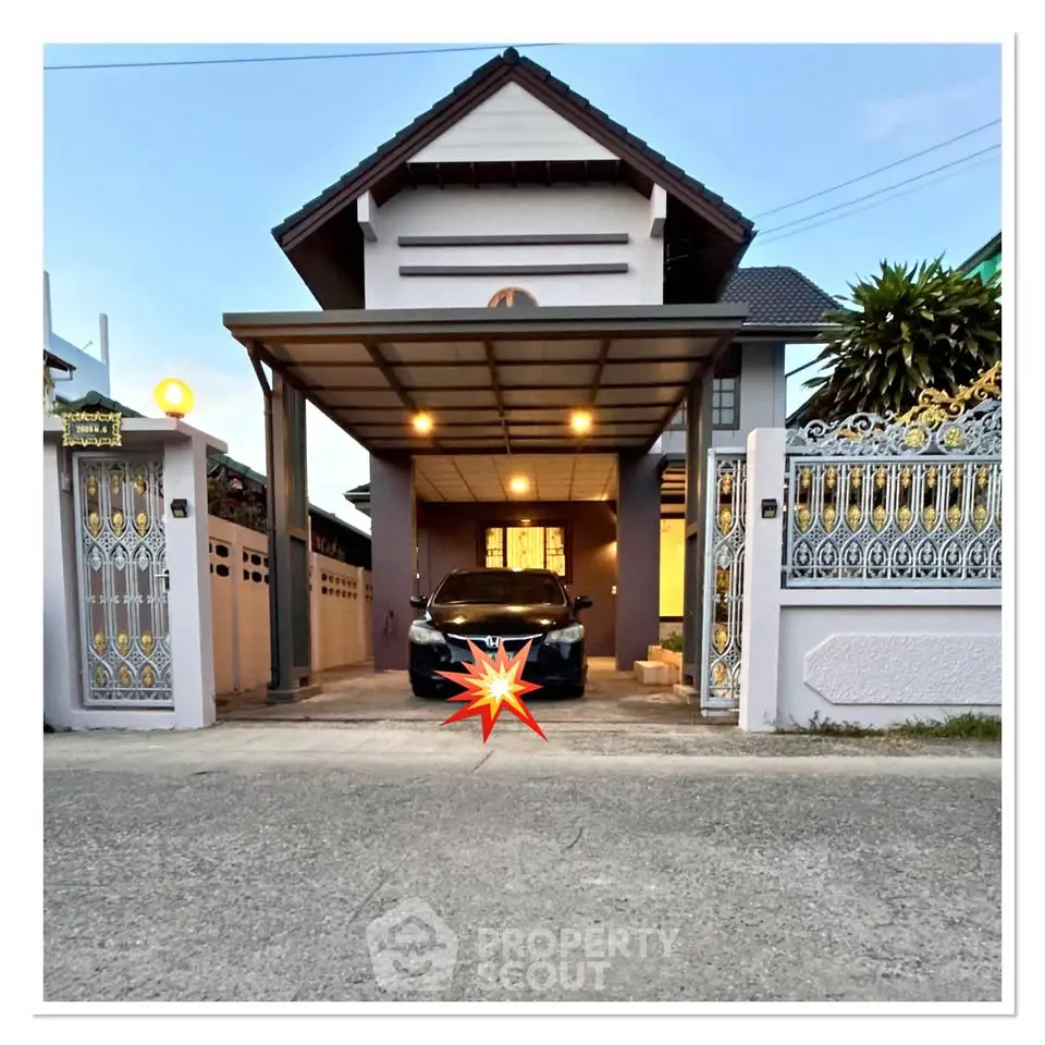 Charming two-story house with carport and decorative gate in a serene neighborhood.