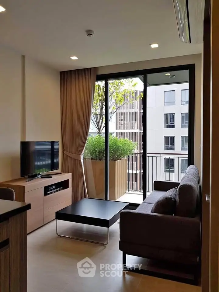 Modern living room with balcony view in stylish apartment