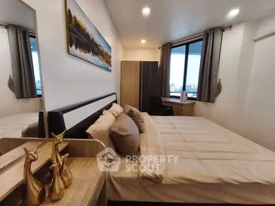 Cozy bedroom with modern decor and large window view