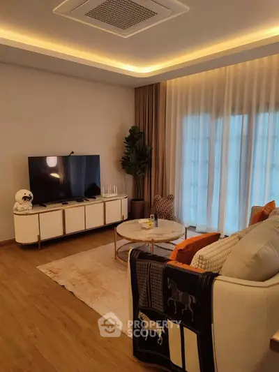 Elegant living room with modern decor and ambient lighting