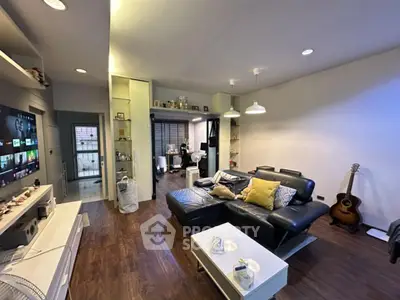 Modern living room with stylish decor and cozy seating area