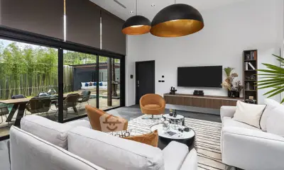 Luxurious modern living room with elegant decor and spacious outdoor view