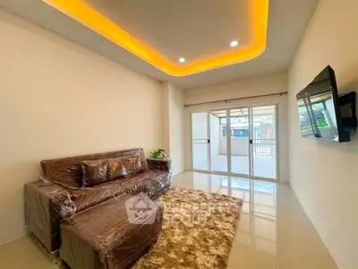 Modern living room with stylish lighting and cozy furniture