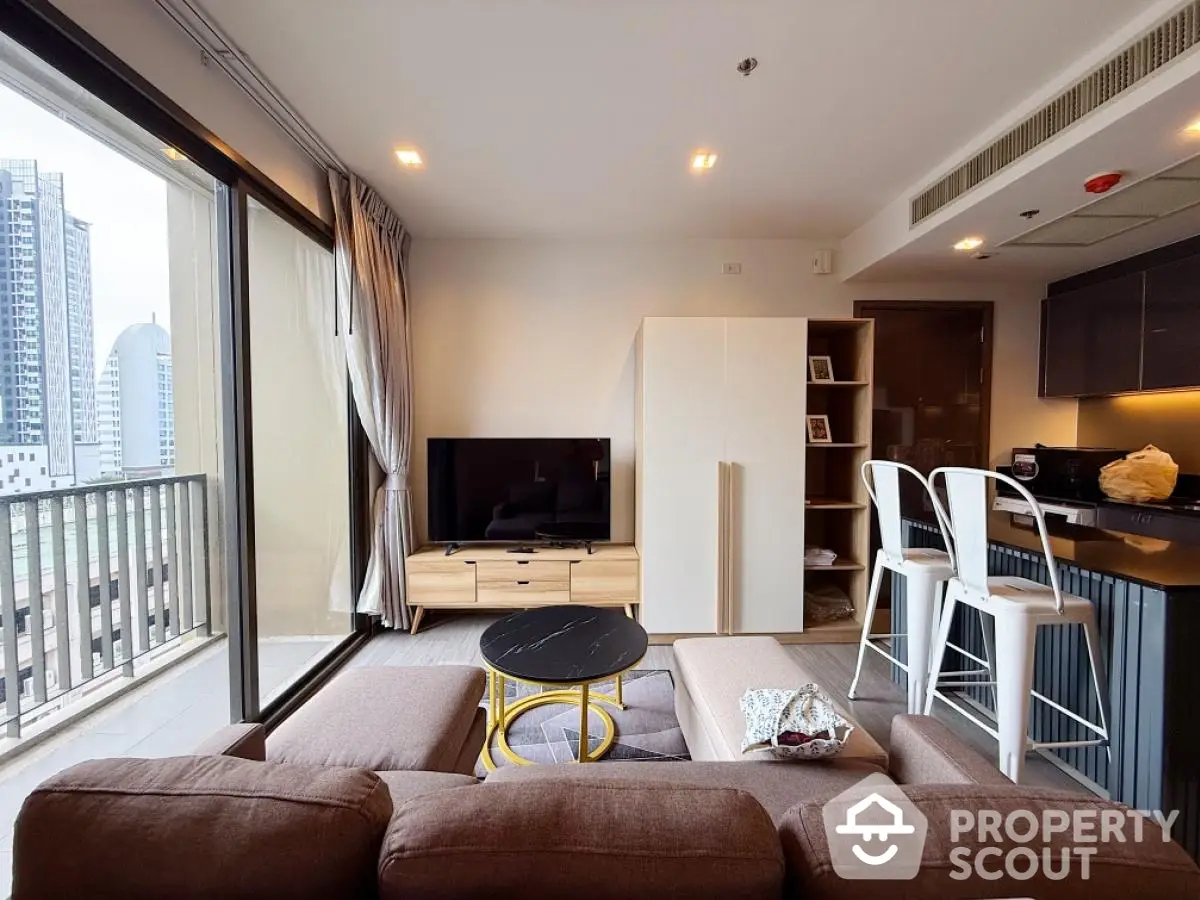 Modern living room with balcony view in urban apartment