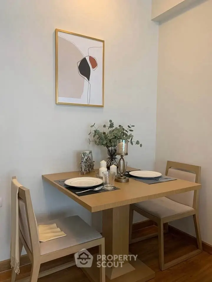 Cozy dining nook with modern decor and elegant table setting.