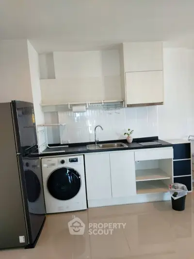 Modern kitchen with sleek appliances and minimalist design