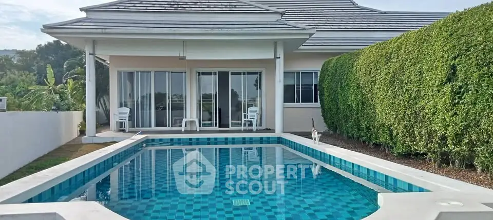 Luxurious villa with private pool and lush garden, perfect for relaxation and entertaining.