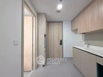 Modern kitchen with sleek cabinetry and minimalist design