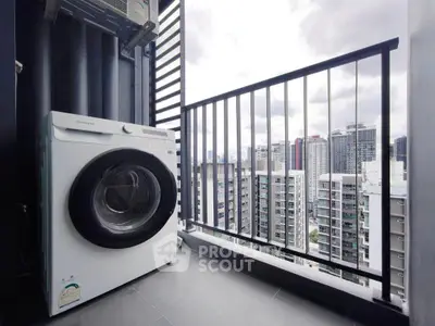 Modern balcony with washing machine and city skyline view