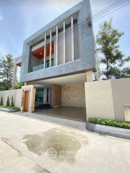 Modern luxury house exterior with sleek design and spacious driveway