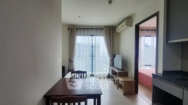 Modern apartment interior with dining area, living room, and city view.
