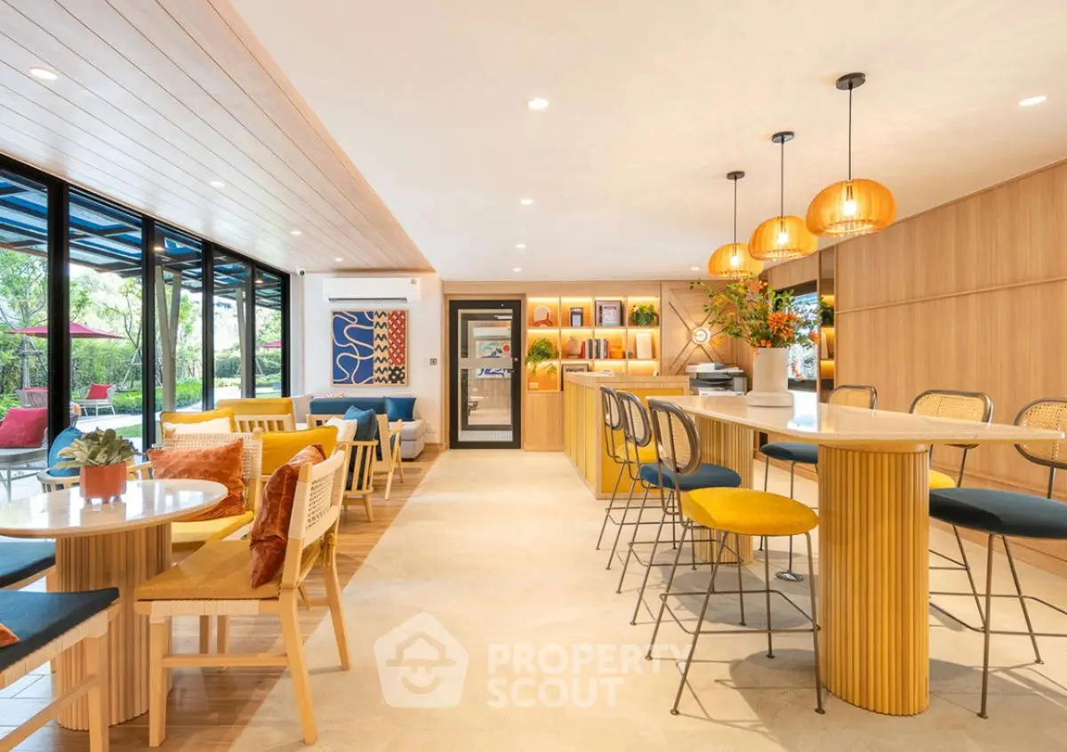 Modern and spacious living area with stylish decor and ample natural light.