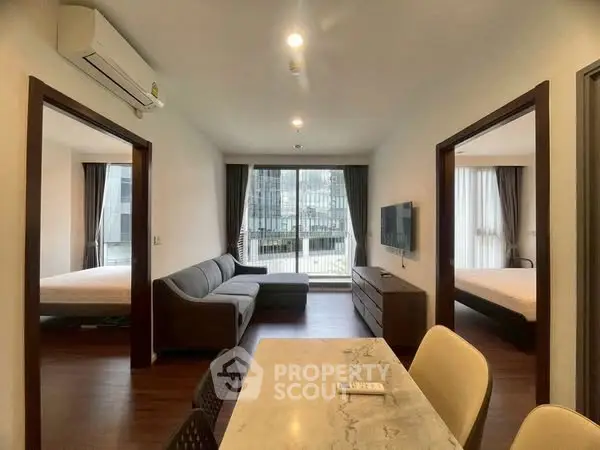 Modern apartment interior with spacious living area and two bedrooms