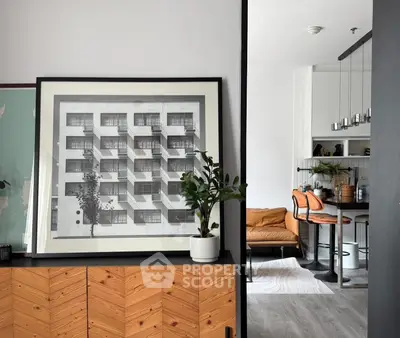 Stylish modern interior with framed art and cozy seating area