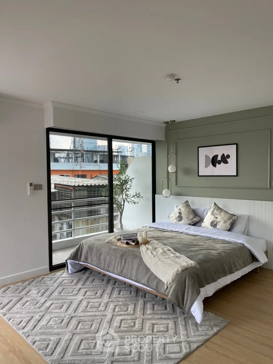Modern bedroom with large windows and stylish decor, featuring a cozy bed and elegant lighting.