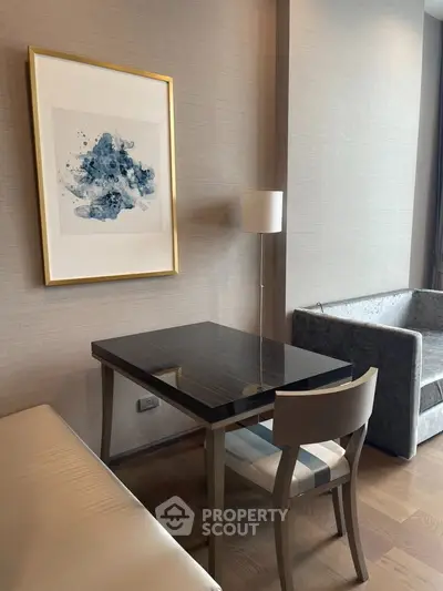 Elegant modern living room with stylish furniture and abstract art, perfect for urban living.