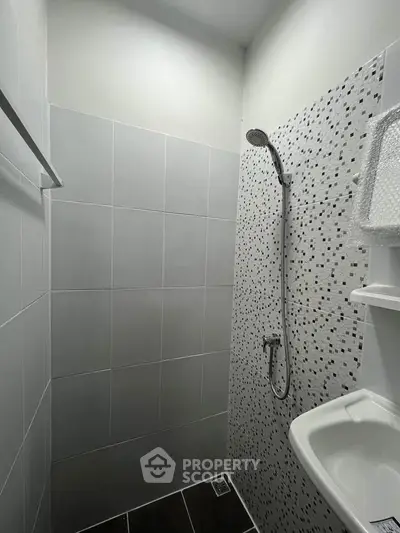 Modern bathroom with sleek shower design and stylish tile work