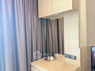 Modern bedroom with stylish vanity and elegant curtains