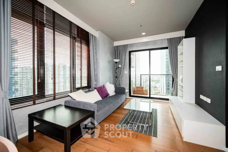 Modern living room with city view and stylish decor