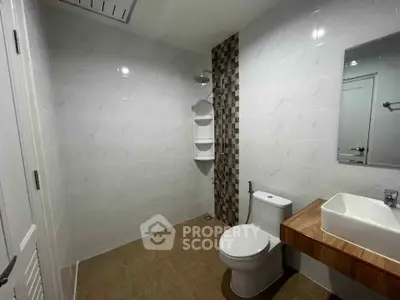 Modern bathroom with sleek fixtures and stylish tile design