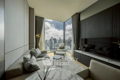 Luxurious modern living room with stunning city view and elegant furnishings.