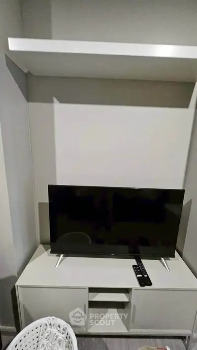 Modern living room with sleek TV setup and minimalist design