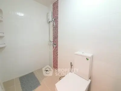 Modern bathroom with shower and toilet in minimalist design