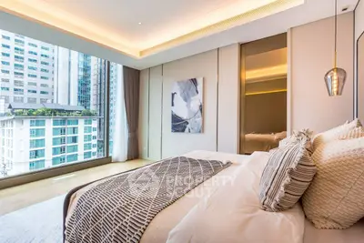 Luxurious bedroom with modern decor and stunning city view