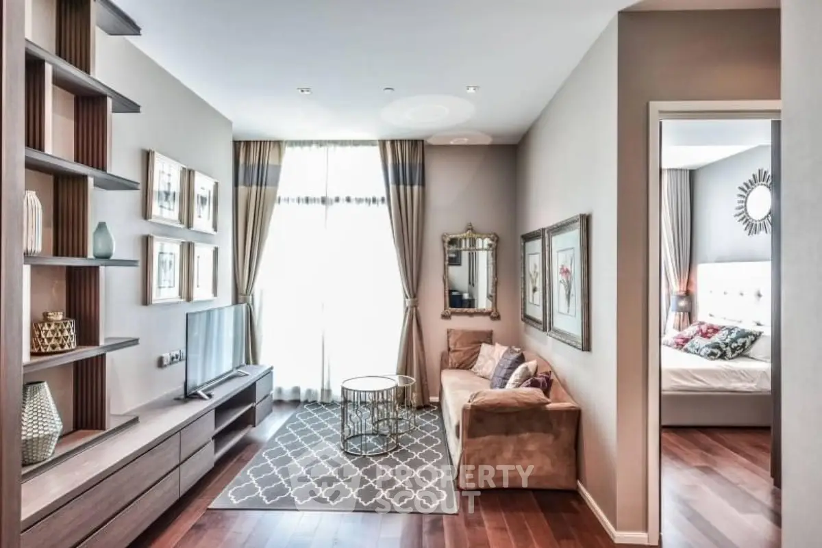 Stylish living room with modern decor and natural light in a cozy apartment.