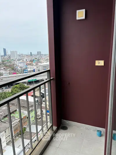 Urban balcony with city view, perfect for enjoying skyline vistas.