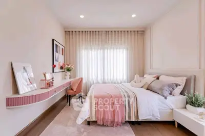 Charming bedroom with elegant decor and soft lighting, perfect for relaxation.