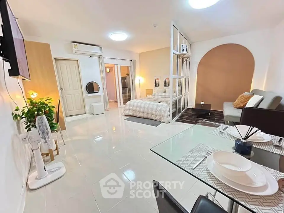 Spacious modern studio apartment with open layout and stylish decor