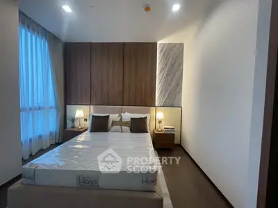 Luxurious modern bedroom with elegant lighting and stylish decor