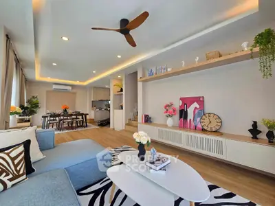 Spacious modern living room with stylish decor and open layout