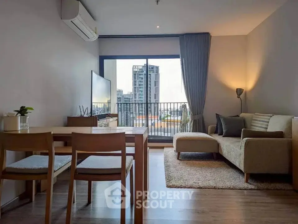Modern living room with balcony view in stylish apartment