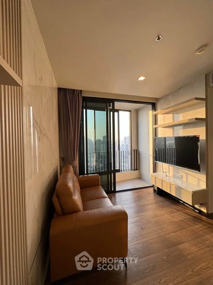 Modern living room with leather sofa and city view balcony