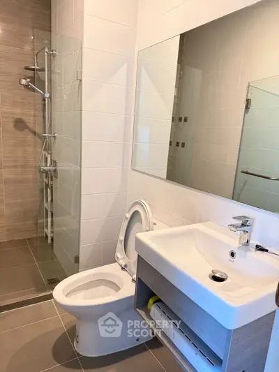 Modern bathroom with sleek fixtures and walk-in shower