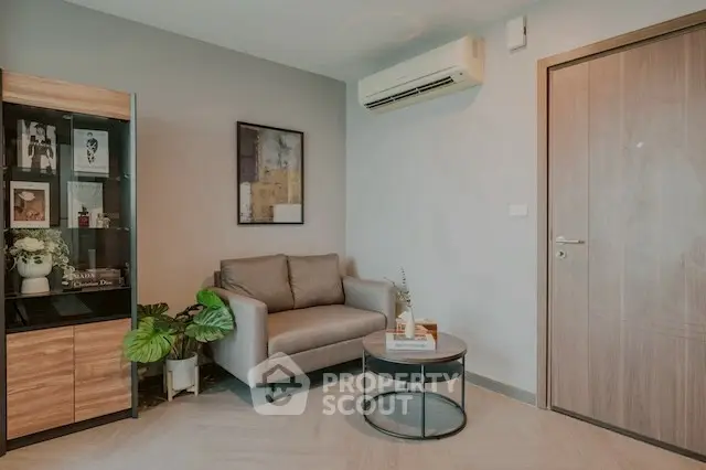 Modern living room with stylish decor and air conditioning