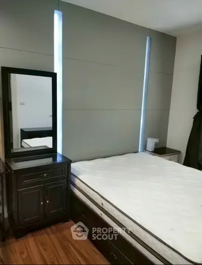 Modern bedroom with sleek design and stylish furniture