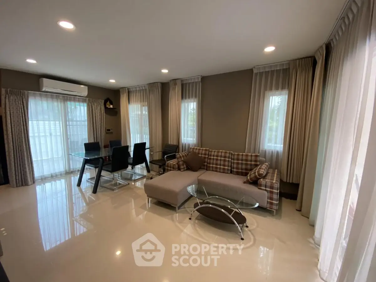 Spacious modern living room with elegant furniture and natural light
